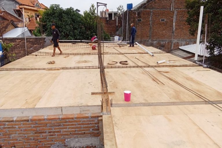 Construction Workers Building House Foundation