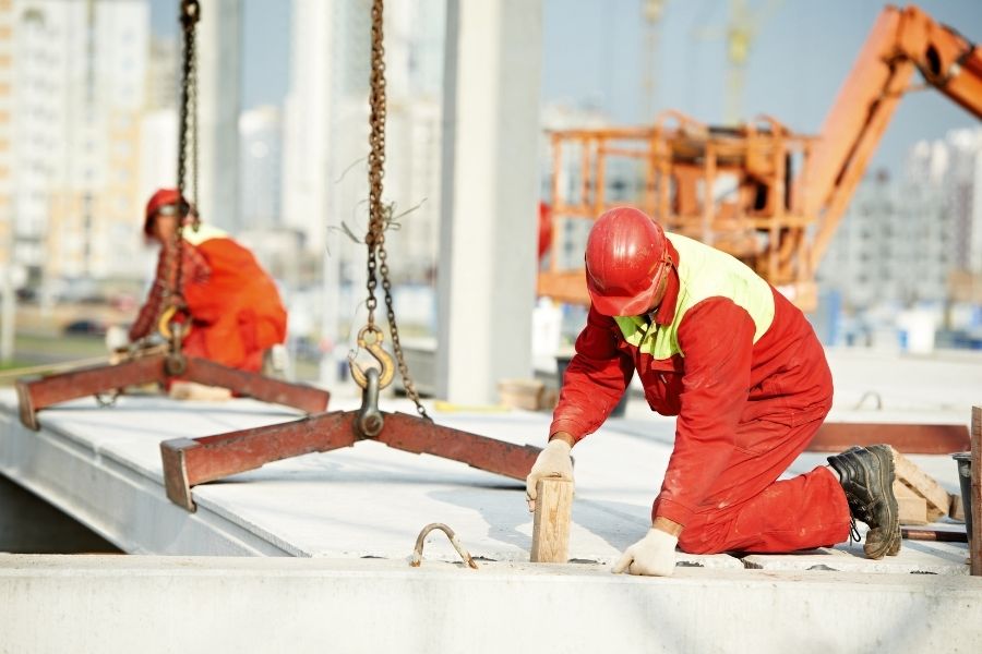 Builder Worker Installing Concrete Slab